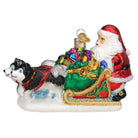 Santa's dog sled ornament by Old World Christmas featuring a festive dog sled with reindeer and holiday decorations.