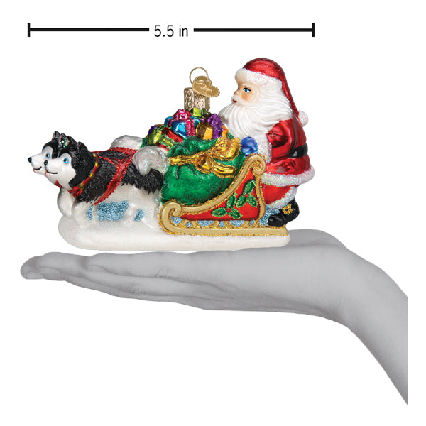 Santa's dog sled ornament from Old World Christmas featuring a festive dog pulling a decorated sled.