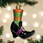 Old World Christmas Witches Shoe Ornament featuring a detailed black and orange witch's shoe with festive Halloween accents.