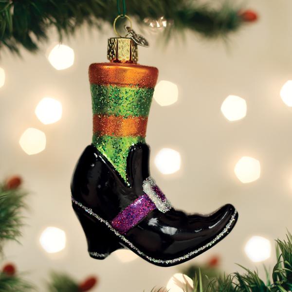 Old World Christmas Witches Shoe Ornament featuring a detailed black and orange witch's shoe with festive Halloween accents.
