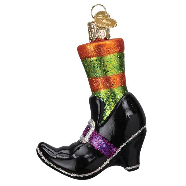 Old World Christmas witches shoe ornament featuring a miniature black shoe with spooky Halloween details.