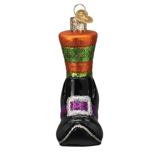 Old World Christmas Witches Shoe Ornament featuring a detailed black and purple witch's shoe with decorative accents.