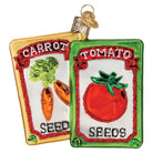 Old World Christmas garden seeds ornament featuring colorful seed packet design with detailed garden imagery.