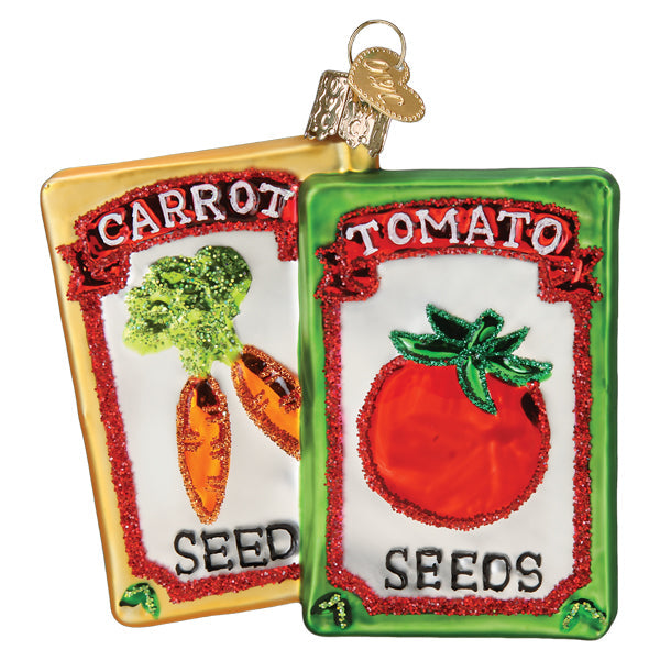 Old World Christmas garden seeds ornament featuring colorful seed packet design with detailed garden imagery.