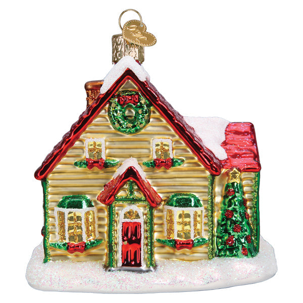 Old World Christmas Christmas Cottage Ornament featuring a detailed, festive holiday scene with a cozy cottage and winter decor.