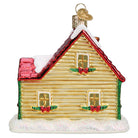 Old World Christmas Christmas Cottage Ornament featuring a detailed, festive ceramic holiday house with snow and holiday decorations.
