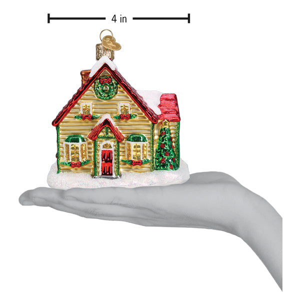 Old World Christmas Christmas Cottage Ornament featuring a detailed miniature holiday cottage with festive decorations.