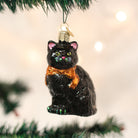 Old World Christmas Halloween Kitty Ornament featuring a festive black cat with orange accents and Halloween-themed details.
