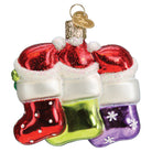 Old World Christmas Snow Family of 3 ornament featuring a festive snow family figurine with winter attire and holiday accessories.