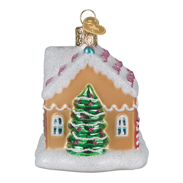 Colorful sugar-coated cottage ornament from Old World Christmas, featuring a festive, detailed holiday design with snowy accents.