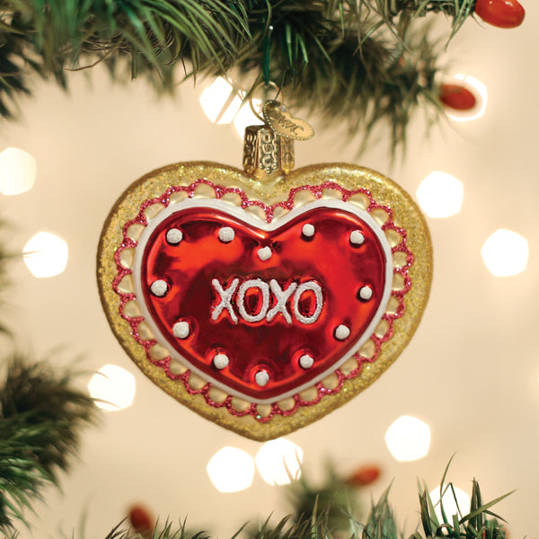 Old World Christmas Heart Cookie Ornament featuring a detailed, colorful cookie design with a festive heart shape.