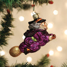 Old World Christmas Witch on Broomstick ornament featuring a detailed witch figure riding a broomstick.