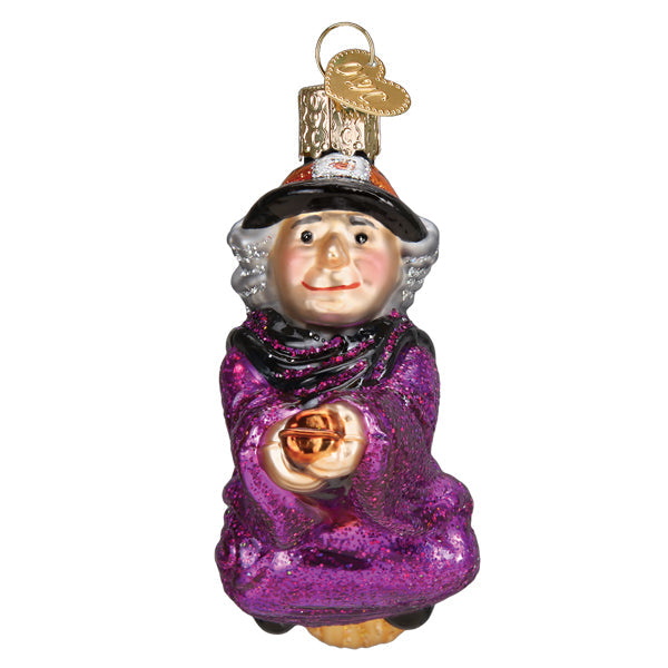 Old World Christmas witch on broomstick ornament featuring a detailed witch figure riding a broomstick.
