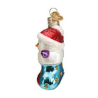 Old World Christmas Snow Family of 5 ornament featuring a festive snow family with winter attire and holiday decorations.