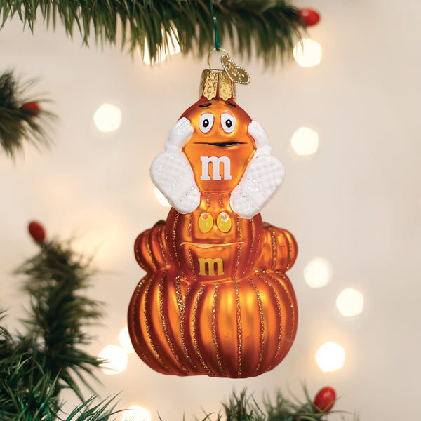 Old World Christmas M&M'S Orange Autumn Ornament, detailed pumpkin-shaped holiday decoration with M&M'S branding.