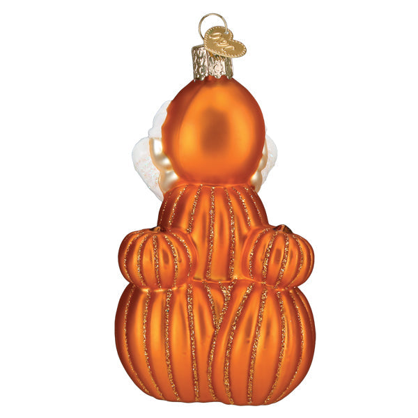 Old World Christmas M&M'S Orange Autumn Ornament, detailed orange candy corn-shaped holiday decor.