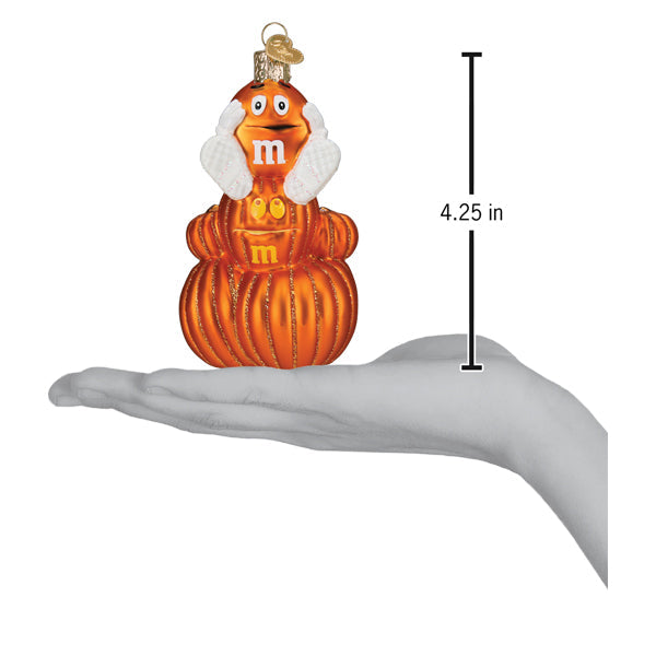 Old World Christmas M&M'S Orange Autumn Ornament showing a detailed orange candy-shaped ornament on a white background.