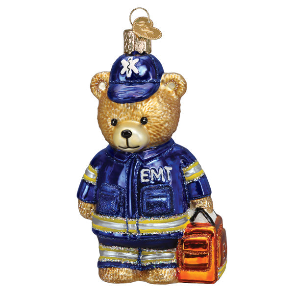 Old World Christmas EMT teddy bear ornament featuring a plush, detailed teddy bear design for holiday decoration.