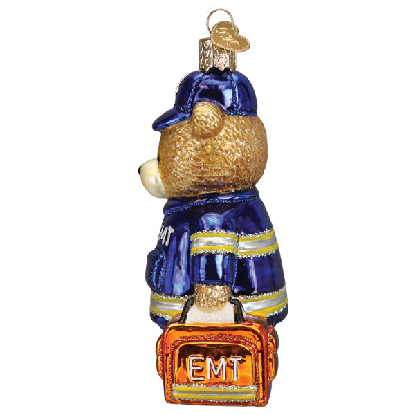 Old World Christmas EMT Teddy Bear Ornament featuring a cute teddy bear in medical scrubs with a stethoscope.