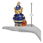 Old World Christmas EMT Teddy Bear Ornament featuring a plush teddy bear in medical scrubs and EMT gear.