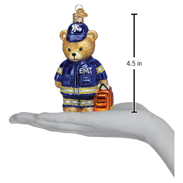 Old World Christmas EMT Teddy Bear Ornament featuring a plush teddy bear in medical scrubs and EMT gear.