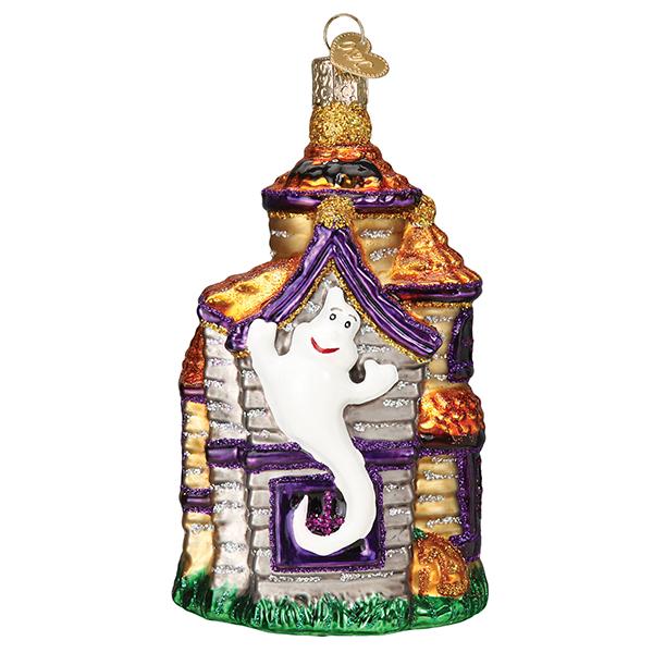 Old World Christmas Haunted Mansion ornament featuring a spooky haunted house design in vibrant colors.