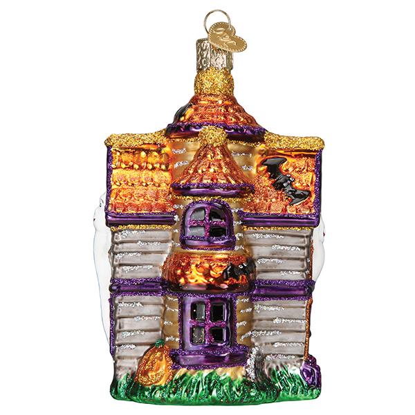 Old World Christmas Haunted Mansion ornament showing a spooky haunted house with detailed windows and eerie design.