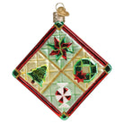 Old World Christmas Christmas quilt ornament featuring colorful patchwork design and festive holiday patterns.