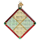 Old World Christmas Christmas quilt ornament featuring festive fabric patchwork and holiday-themed design.