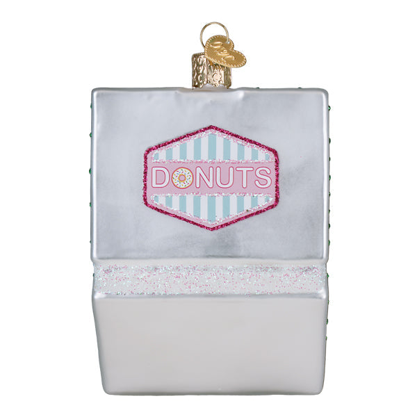 Old World Christmas Box of Donuts ornament featuring colorful donut shapes with sprinkles, perfect for holiday decor.
