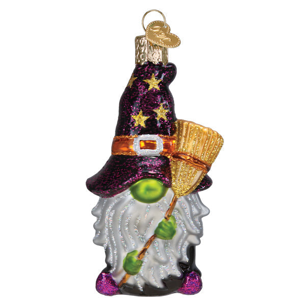 Old World Christmas Witch Gnome Ornament hanging with detailed witch hat and gnome features, festive holiday decor.