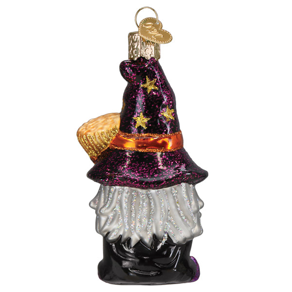 Old World Christmas Witch Gnome Ornament with pointed hat and broom, detailed Halloween-themed decor accessory.