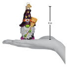 Old World Christmas Witch Gnome Ornament featuring a whimsical gnome with a pointed hat and broomstick, festive holiday decor.