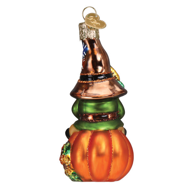 Old World Christmas Fall Harvest Gnome figurine with a pumpkin hat and autumn decorations, detailed holiday collectible.