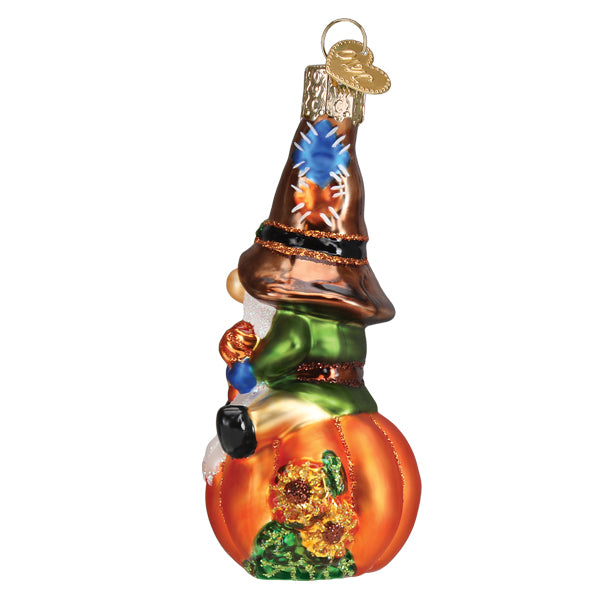 Colorful Fall Harvest Gnome ornament by Old World Christmas with a pumpkin hat and autumn-themed attire.