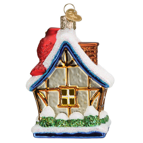 Old World Christmas Cardinal Birdhouse Ornament featuring a detailed red cardinal perched on a miniature birdhouse.