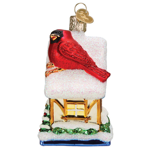 Colorful Cardinal Birdhouse ornament by Old World Christmas, featuring a festive red cardinal perched on a decorated birdhouse.