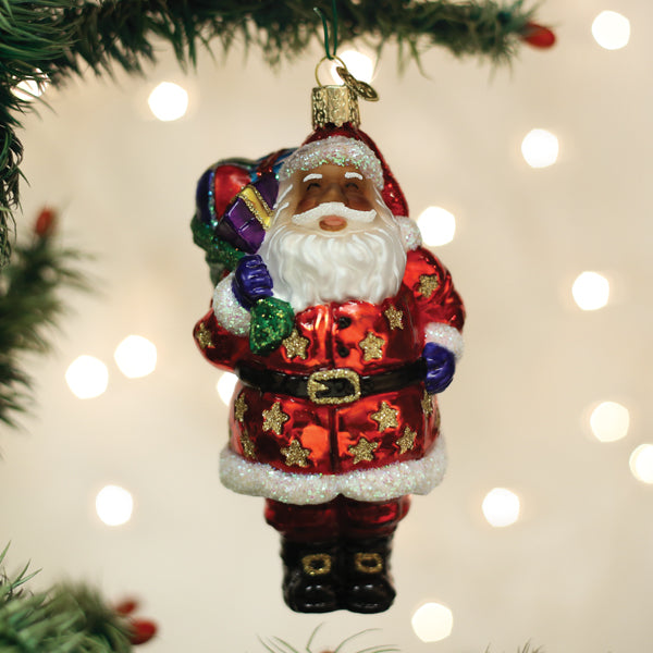 African American Santa Claus ornament by Old World Christmas, featuring a jolly Santa in festive attire.
