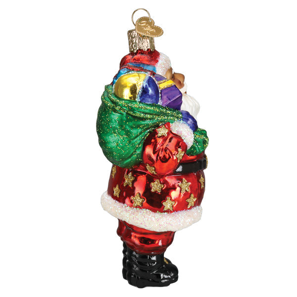 African American Santa ornament from Old World Christmas featuring jolly Santa Claus in festive attire.