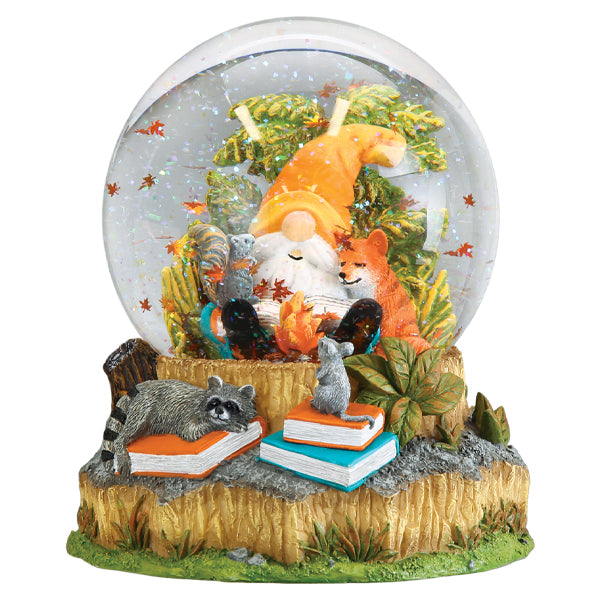 Old World Christmas Autumn Forest Gnome Snow Globe featuring a gnome figure amidst autumn leaves in a decorative glass globe
