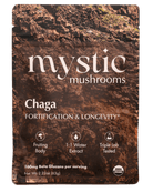 Pack of Ora Cacao Chaga mushroom supplement, showing dried Chaga chunks in a natural, earthy setting.