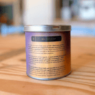 Ora Cacao Triple Fat Cacao Powder in a 12 oz tin, showing the rich, dark cacao powder inside the container.