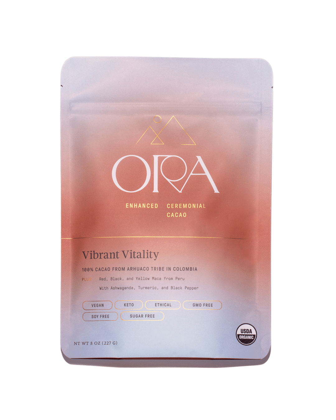Bag of Ora Cacao Vibrant Vitality Enhanced 100% Ceremonial Cacao in a 1 lb package, showing the product label and cacao pieces.