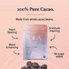 Connected Colombia Ora Cacao pure 100% ceremonial cacao in a one-pound package with cacao beans and rich chocolate texture.