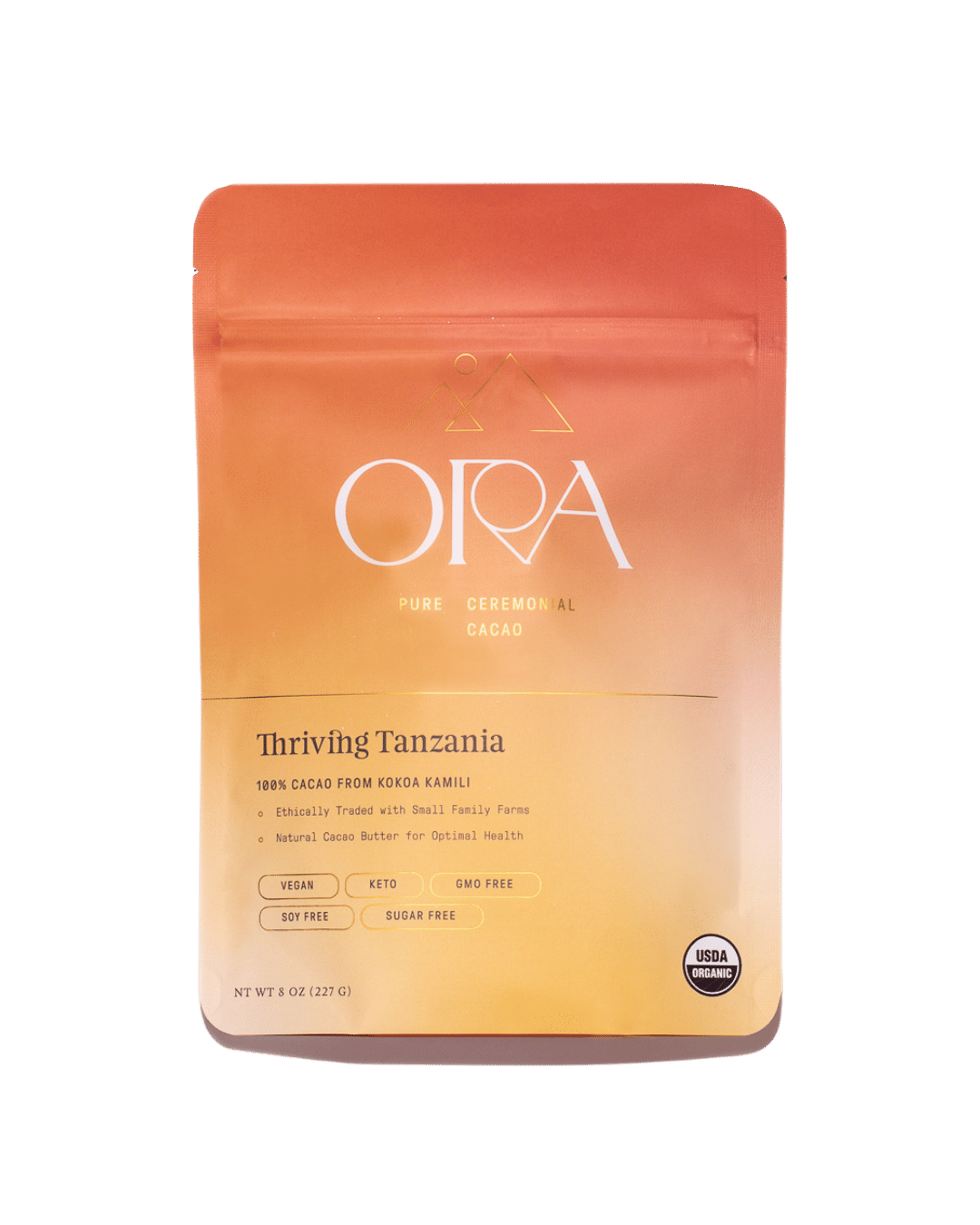Pure 100% ceremonial cacao from Tanzania by Ora Cacao, shown in a 1 lb package, highlighting rich cacao beans and natural processing.