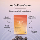Pure 100% ceremonial cacao from Tanzania by Ora Cacao, shown in a 1 lb package with rich cacao beans inside.