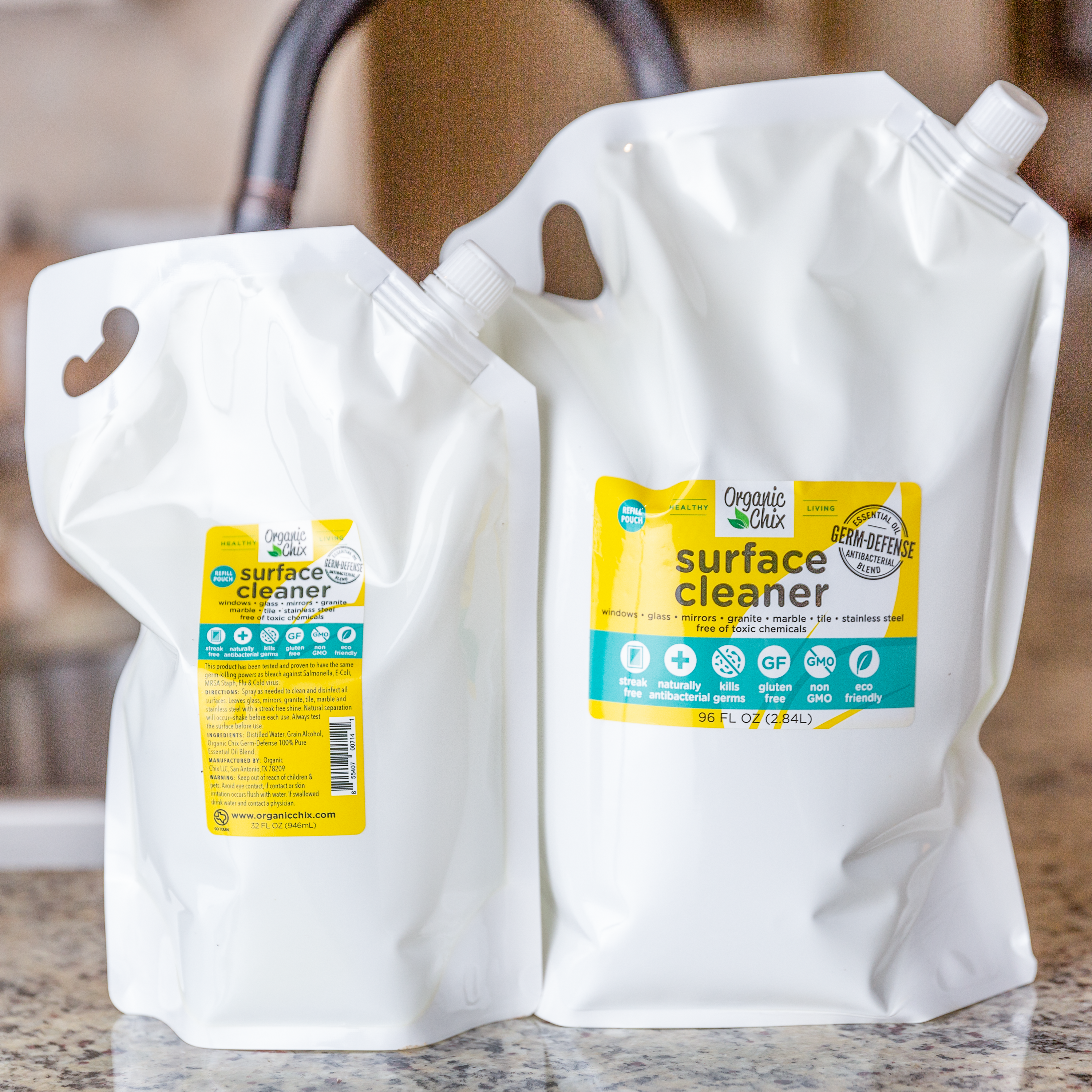 Organic Chix all-purpose surface cleaner in a spray bottle with refill options, ideal for healthy cleaning of various surfaces.