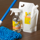 Natural non-toxic wood cleaner by Organic Chix, showing a spray bottle and clean wooden surface for healthy cleaning.