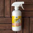 Organic Chix natural non-toxic wood cleaner in a spray bottle, showcasing a clean wooden surface with fresh, natural ingredients.