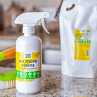 Organic Chix Natural Non-Toxic Stain Remover for healthy laundry, featuring a clear spray bottle with label and stain removal liquid.